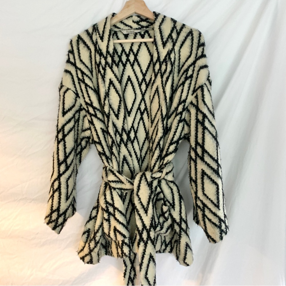 Tucker brand wrap sweater. Cream with geometric pattern. Size L